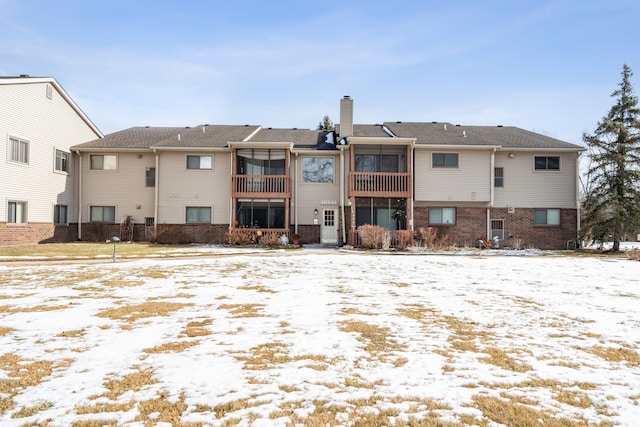 view of snow covered property