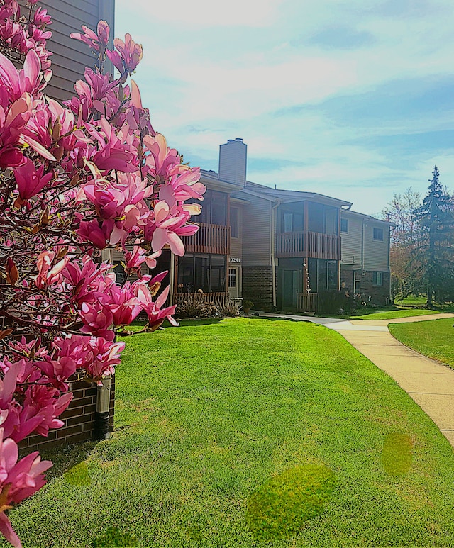 exterior space featuring a lawn