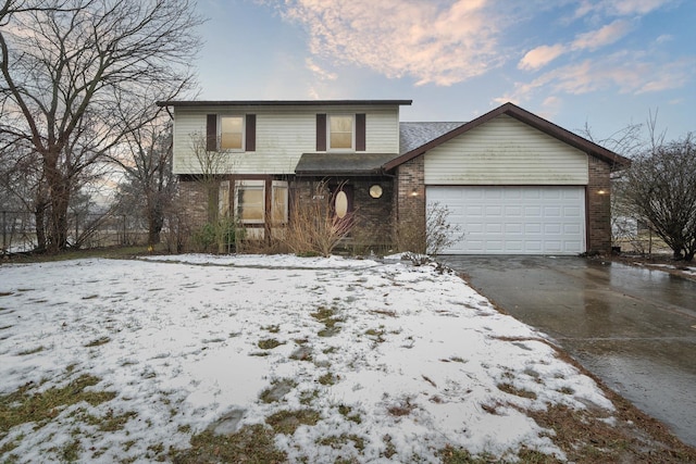 front of property with a garage