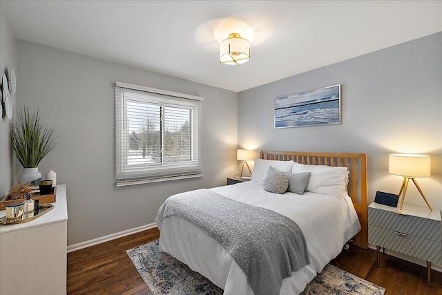 bedroom featuring dark hardwood / wood-style flooring