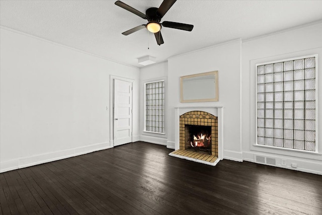 unfurnished living room featuring a textured ceiling, ceiling fan, and dark hardwood / wood-style floors