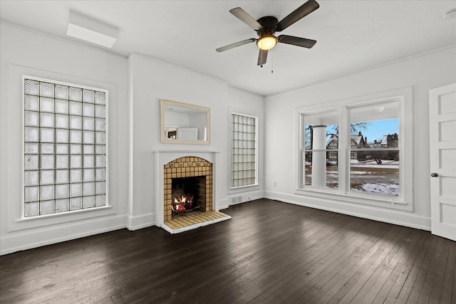 unfurnished living room with dark hardwood / wood-style floors and ceiling fan