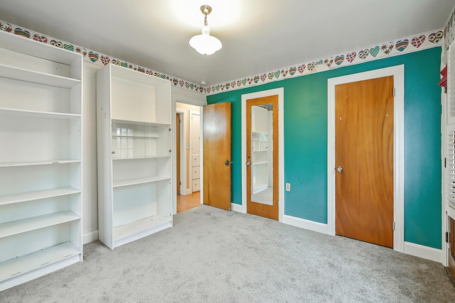 unfurnished bedroom featuring carpet flooring