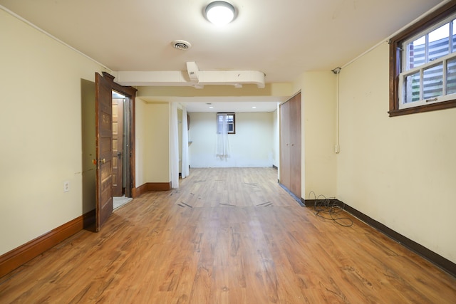 empty room with hardwood / wood-style floors