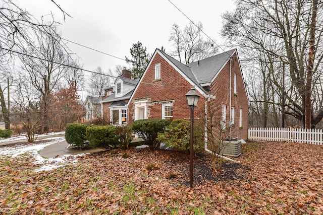 view of home's exterior featuring central AC