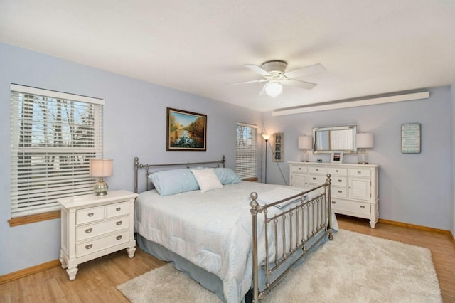 bedroom featuring ceiling fan and light wood-type flooring