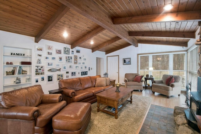 living room with vaulted ceiling with beams, wooden ceiling, and built in shelves