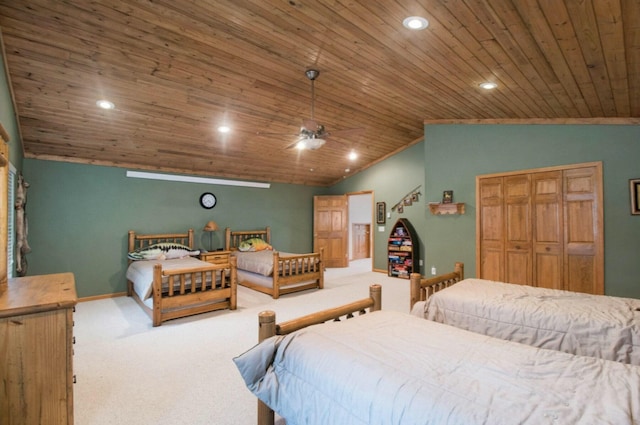 carpeted bedroom with wood ceiling, lofted ceiling, and a closet