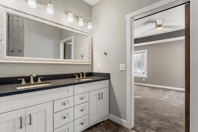 bathroom featuring vanity and ceiling fan