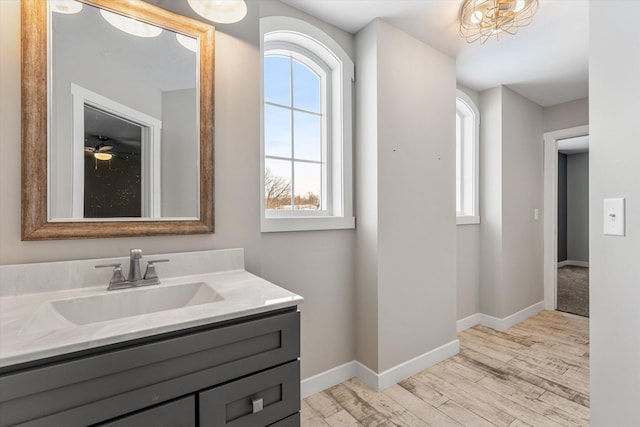 bathroom featuring wood-type flooring and vanity