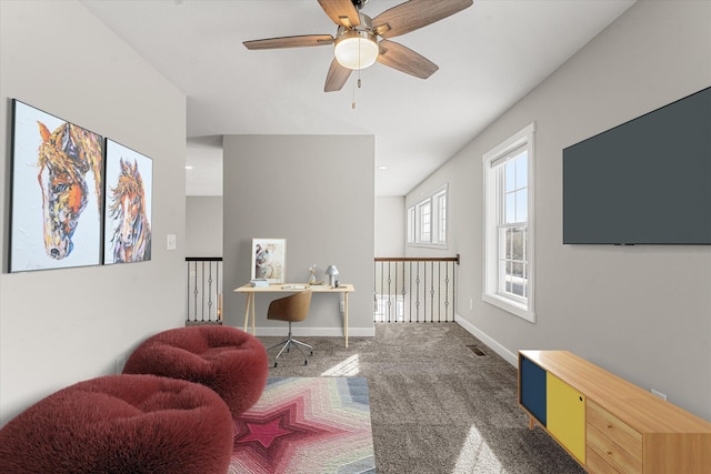 sitting room with carpet flooring