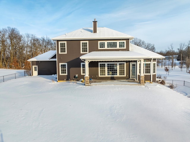 view of snow covered property