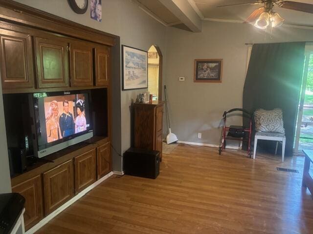 sitting room featuring dark wood-type flooring and ceiling fan