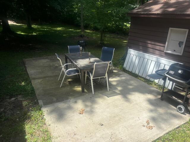 view of patio with a grill