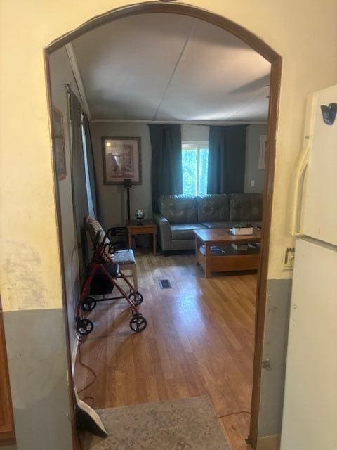 hallway featuring hardwood / wood-style floors