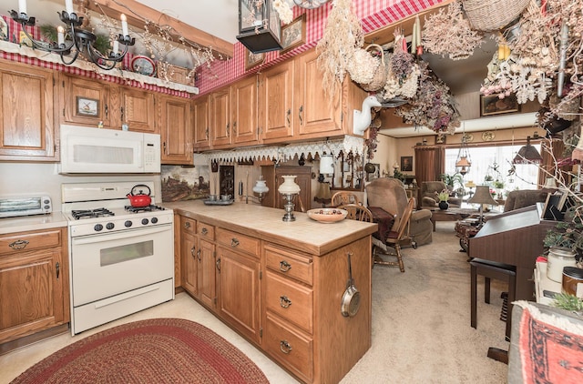 kitchen featuring tasteful backsplash, tile countertops, light colored carpet, and white appliances