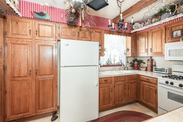 kitchen with beamed ceiling, white appliances, a chandelier, and sink