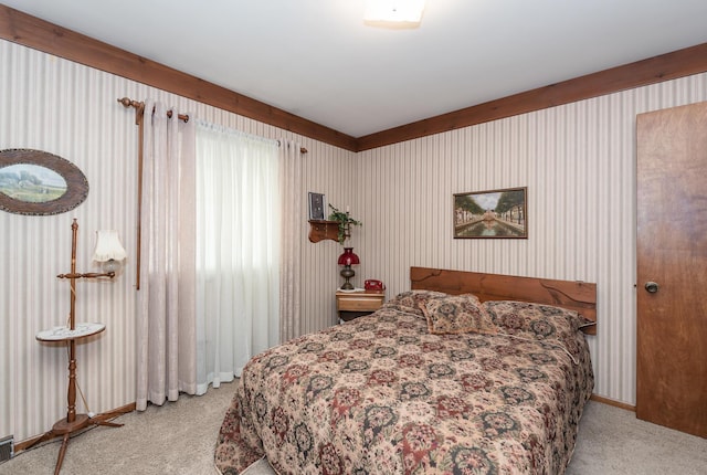 bedroom featuring light colored carpet