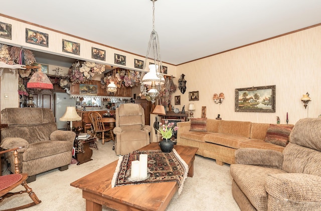 carpeted living room with ornamental molding