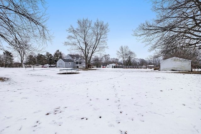 view of yard covered in snow