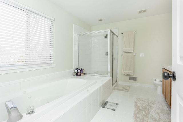 full bathroom featuring vanity, tile patterned floors, plus walk in shower, and toilet