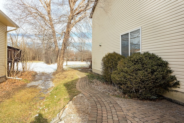 view of yard covered in snow