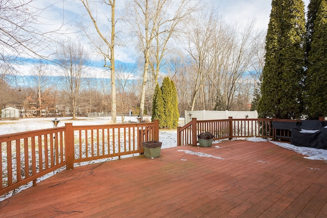 view of snow covered deck