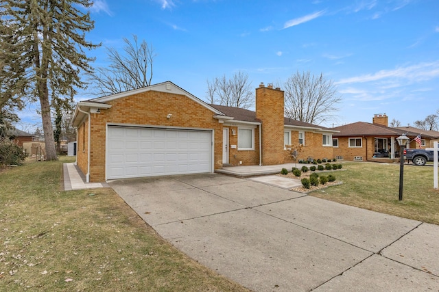 single story home with a garage and a front lawn