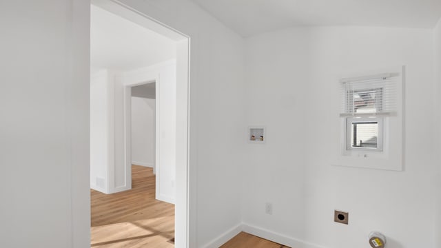 washroom with washer hookup, light wood-style floors, hookup for an electric dryer, laundry area, and baseboards