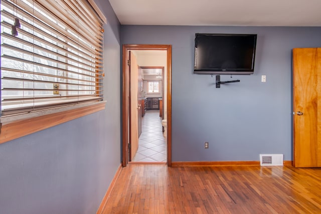 hall featuring hardwood / wood-style floors