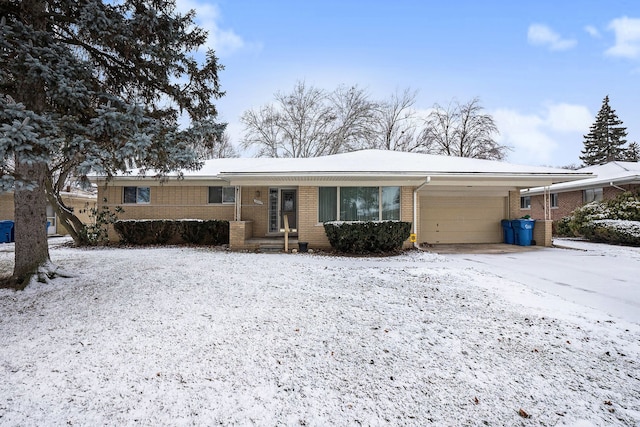 ranch-style house featuring a garage