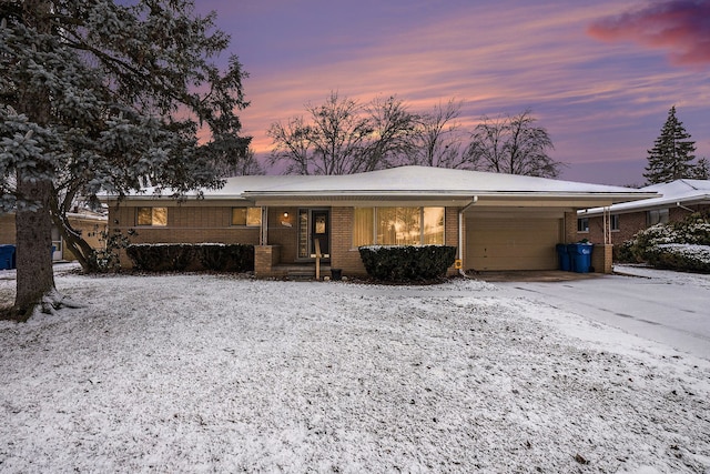 single story home with a garage and a carport