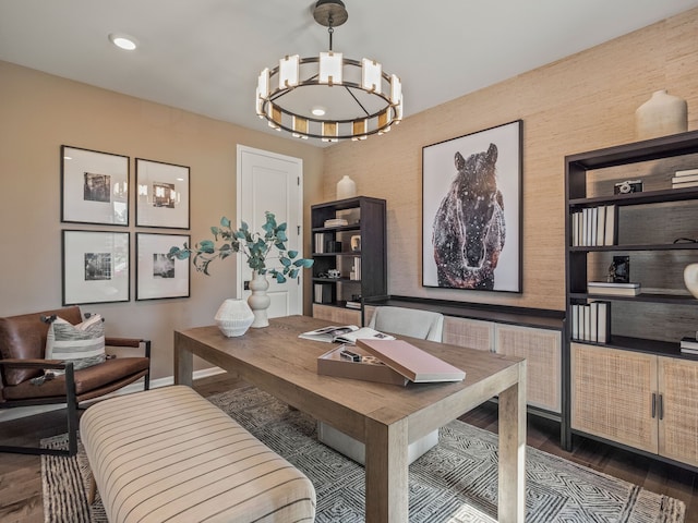 office space featuring recessed lighting, baseboards, an inviting chandelier, and wood finished floors