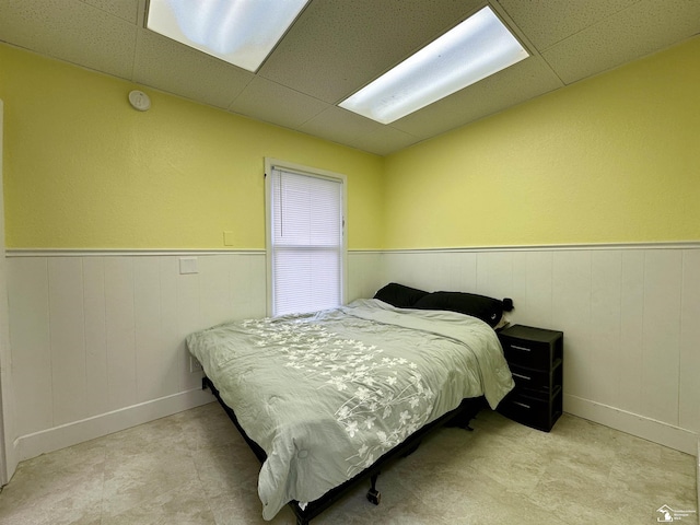 bedroom featuring a drop ceiling