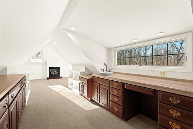 bathroom with lofted ceiling