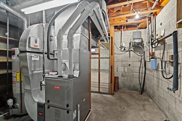 utility room featuring gas water heater