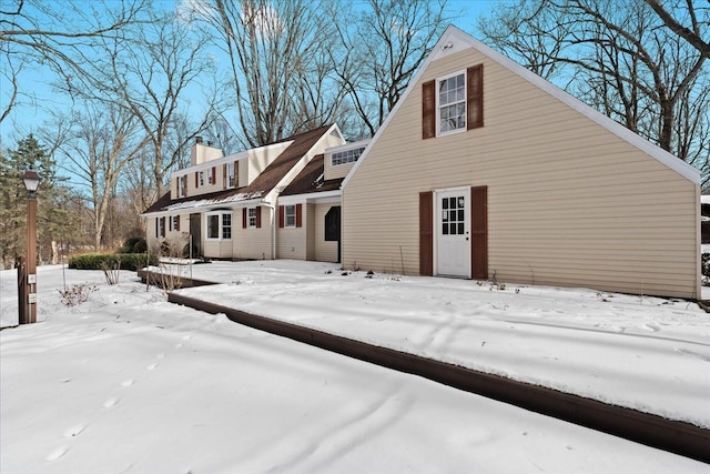 view of snow covered property