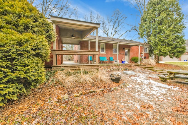 view of front of house with ceiling fan