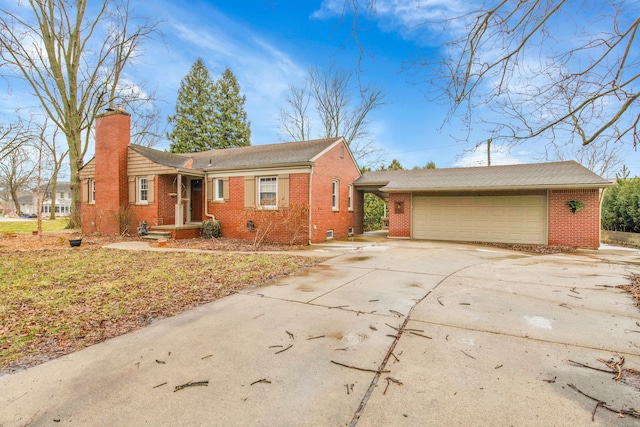 ranch-style house featuring a garage