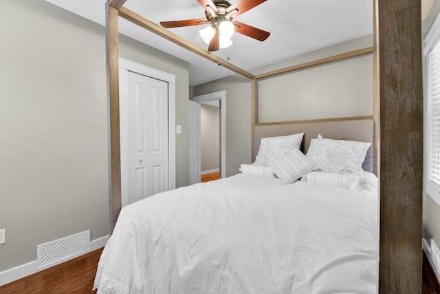 bedroom with hardwood / wood-style flooring and ceiling fan