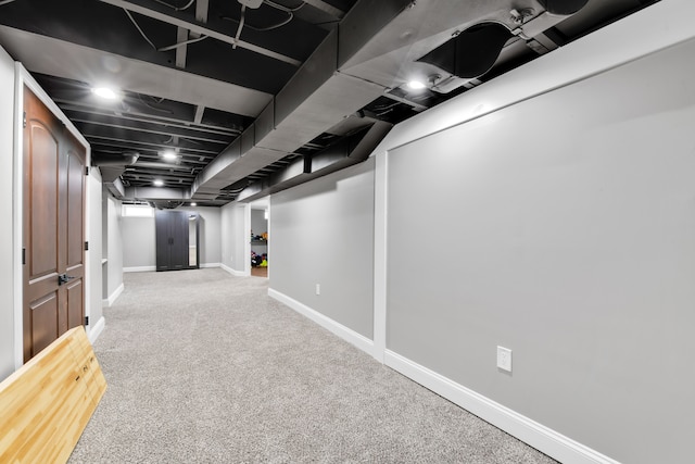 basement featuring carpet