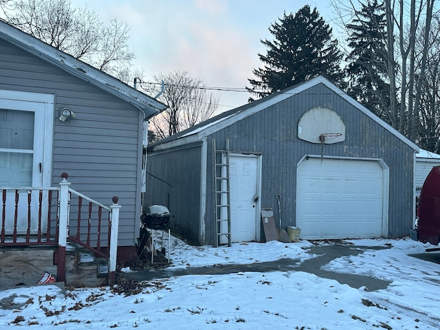 view of snow covered garage