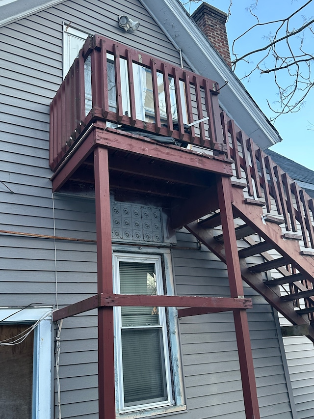 view of property exterior with a balcony