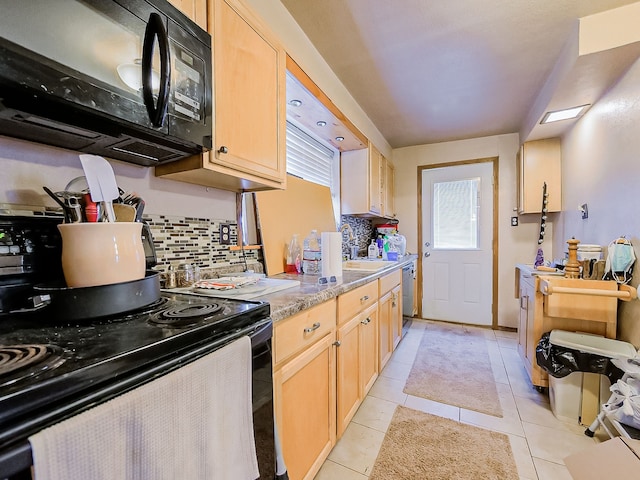 kitchen with light brown cabinetry, sink, decorative backsplash, light tile patterned floors, and black appliances