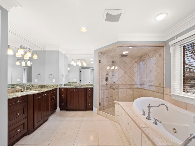 bathroom with tile patterned flooring, crown molding, separate shower and tub, and vanity