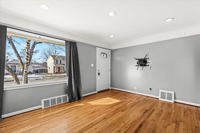 entrance foyer with hardwood / wood-style flooring