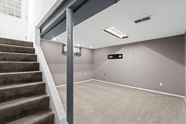 basement featuring carpet floors