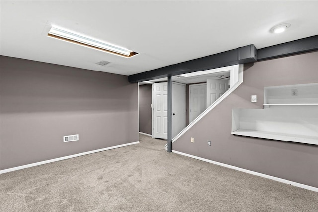 basement with carpet floors