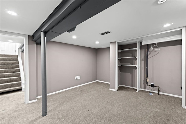 basement featuring carpet flooring