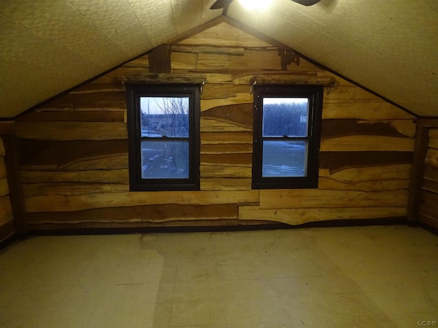 bonus room featuring lofted ceiling